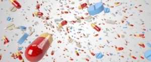 Medcations - pills flying through the air