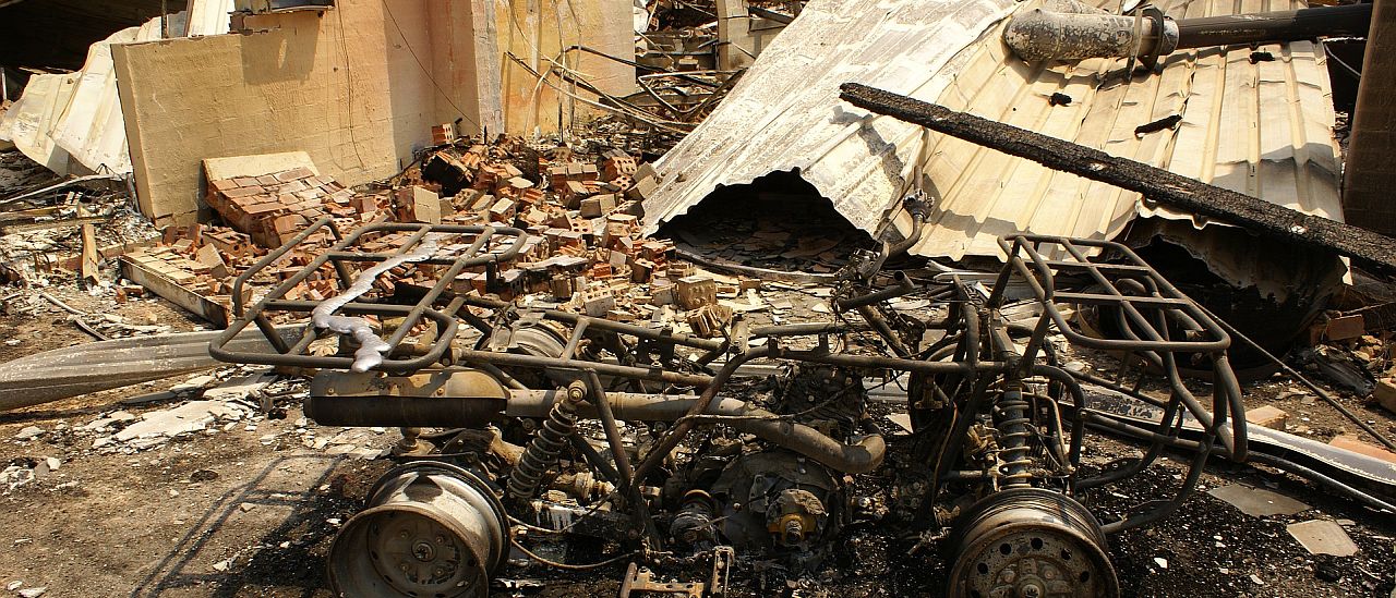 Burnt out house and quad bike - Image by MarkJToomey from Pixabay