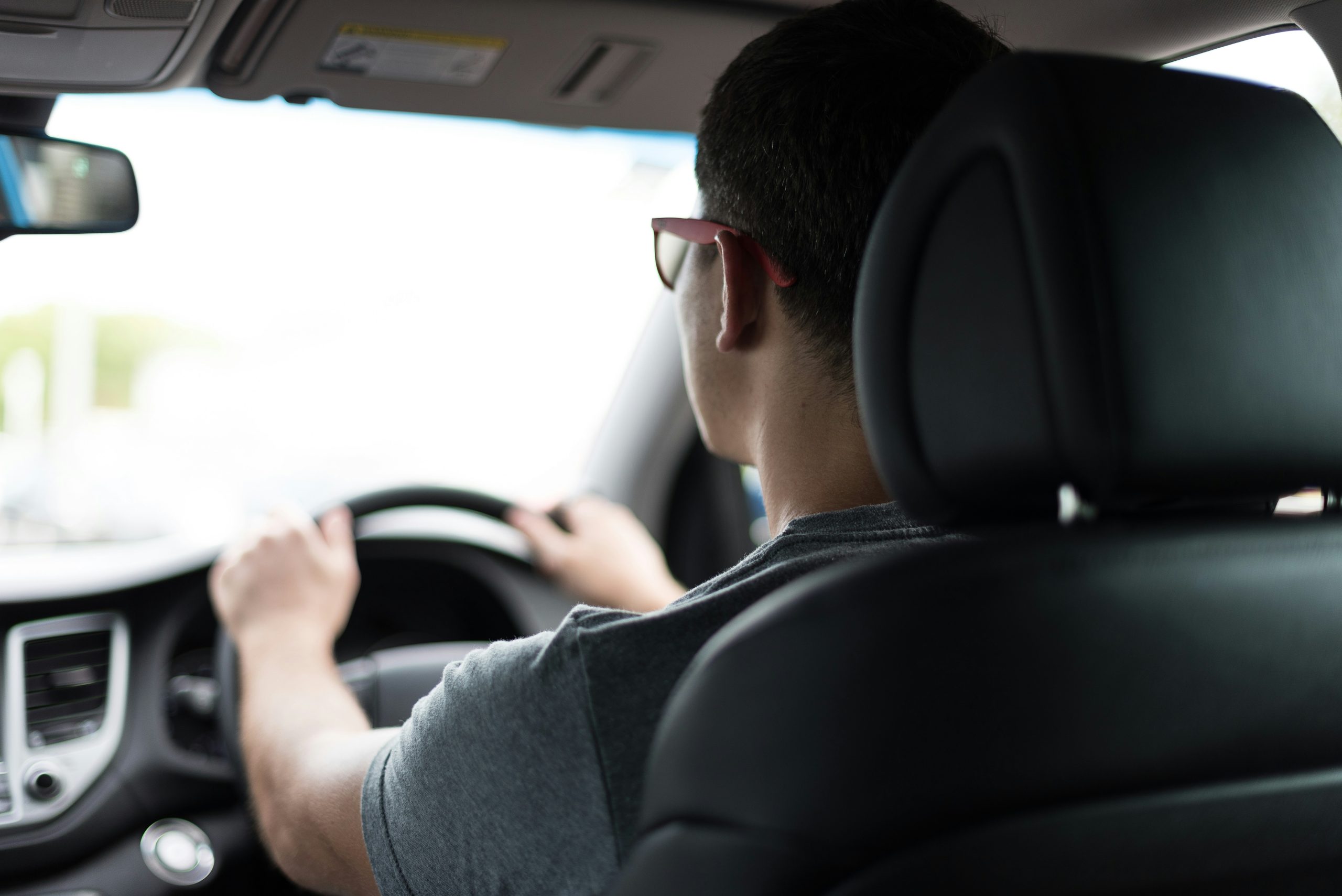 Image of person driving for work