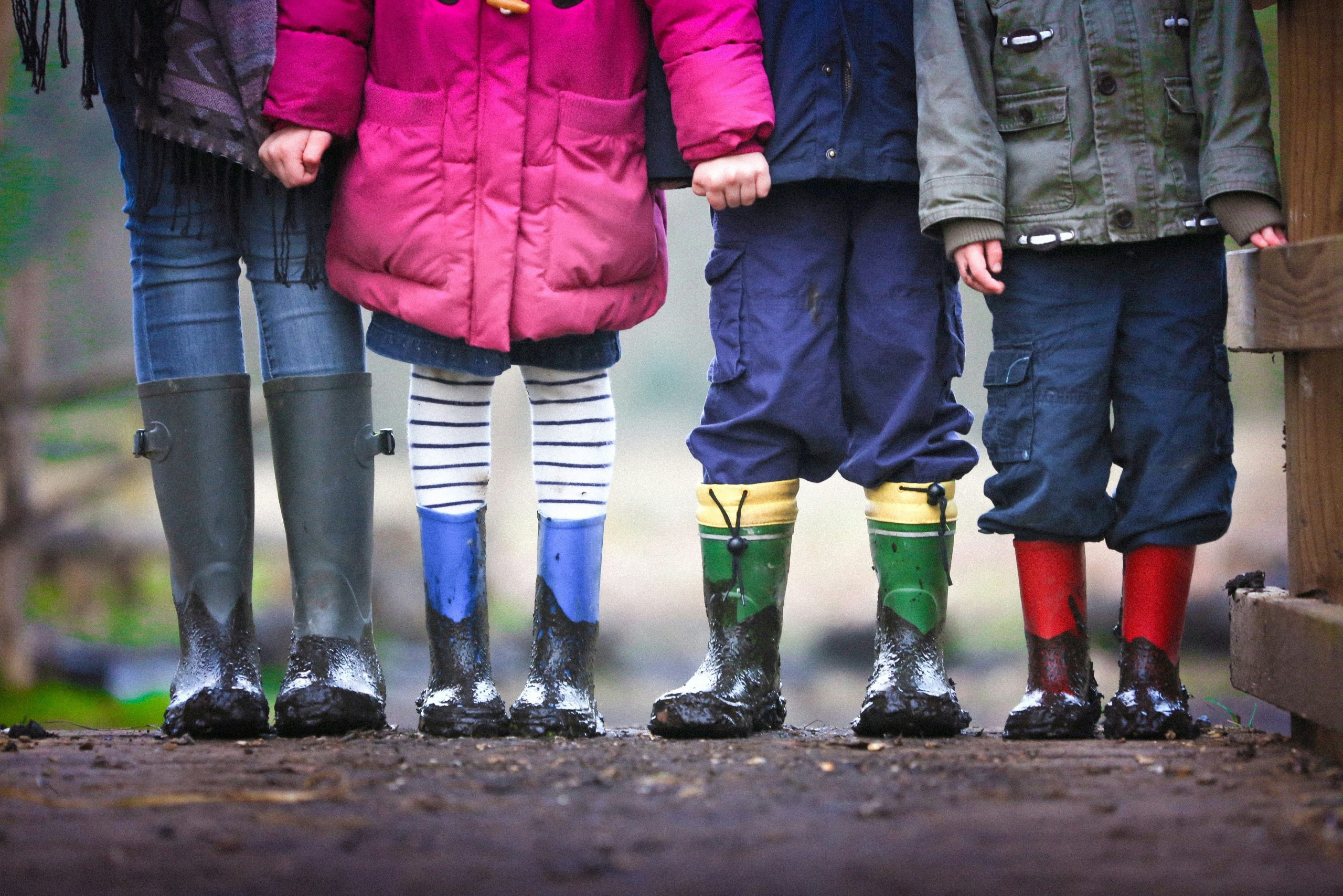 image of young children outside playing representing the child support formula in Family Law matters involving children